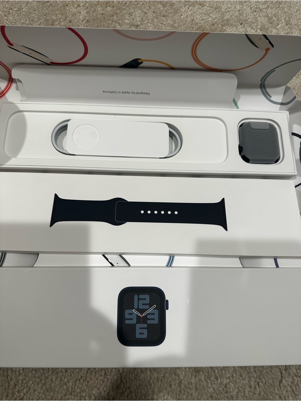 Apple SE Smartwatch with Black Sport Band